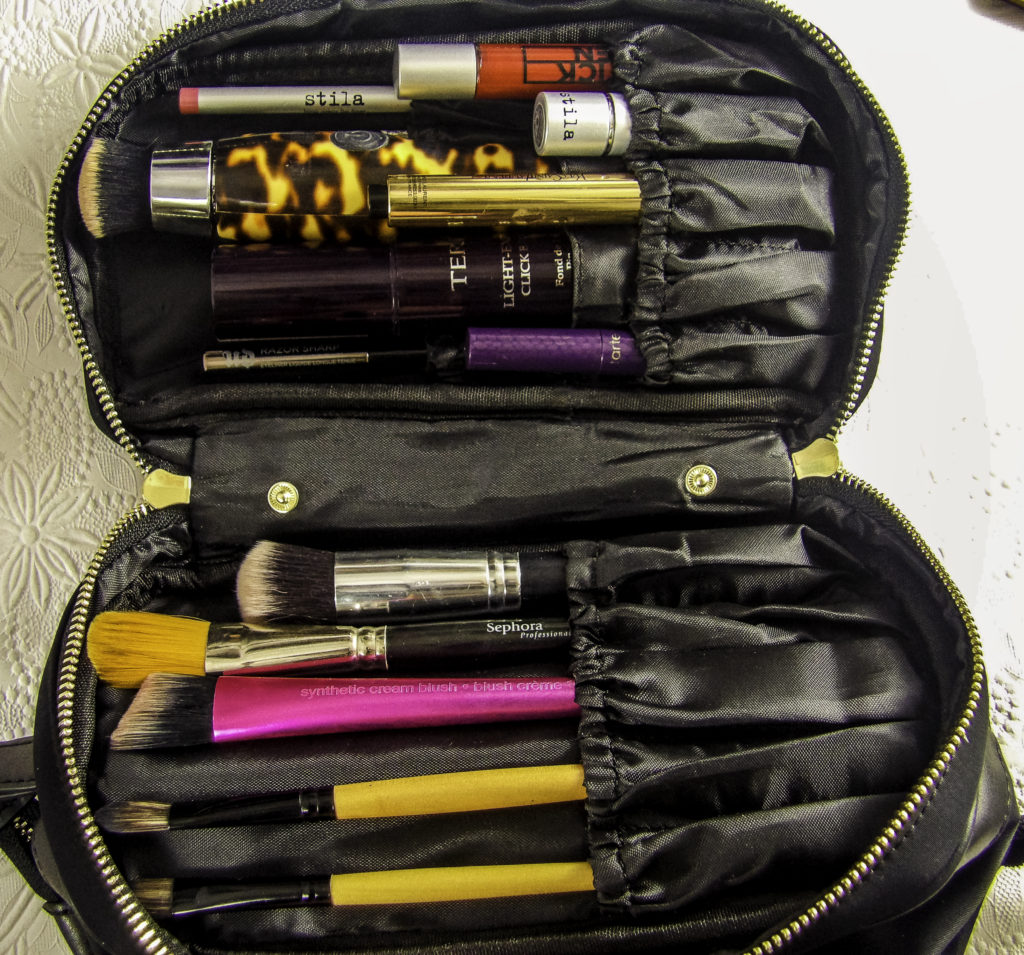 The double brush roll holds brushes, sonic foundation applicators, click pens, lipsticks and liners