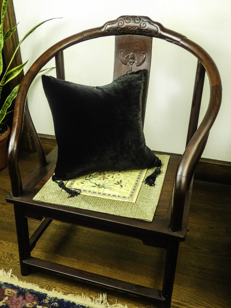 The HomeRight Black Velvet Silk Pillow warms up my stark antique side chair 