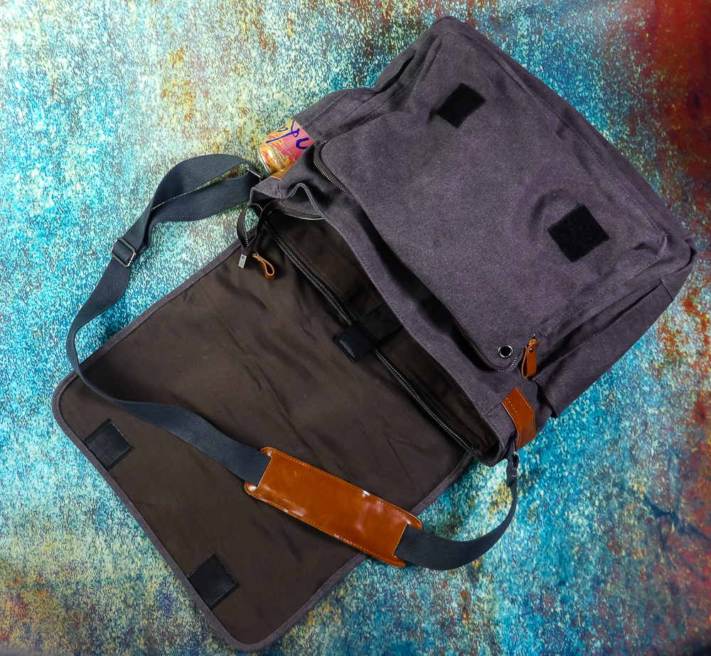 A versatile, sturdy laptop bag with lots of pockets and secure velcro on the outer flap, multiple zippers and velcro secure strap on the laptop compartment