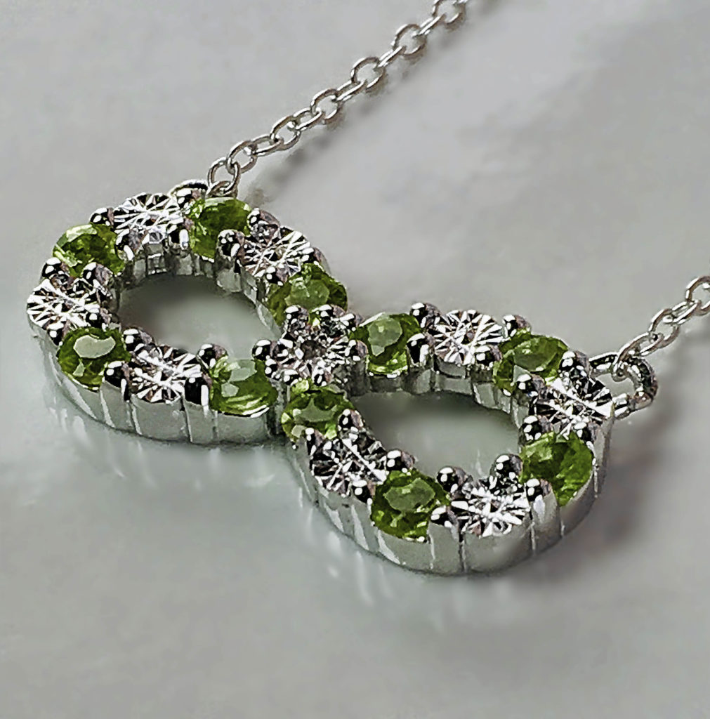 Just in time for spring: the Gem Stone King Peridot and Diamond Infinity Pendant on a Sterling Silver chain