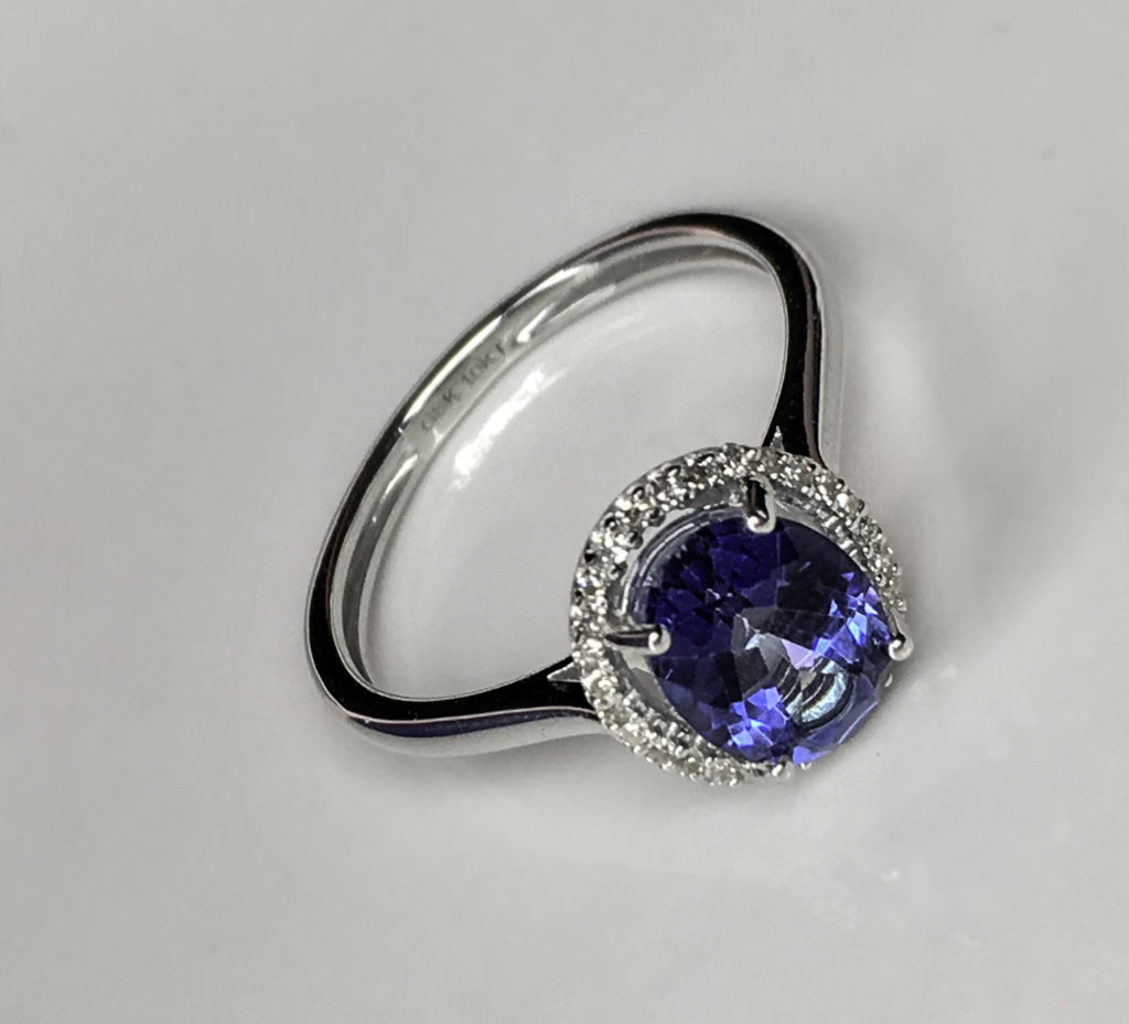 Blue Mystic Topaz has a deep blue color but retains the depth and brilliance of a traditional engagement ring kind of sparkle