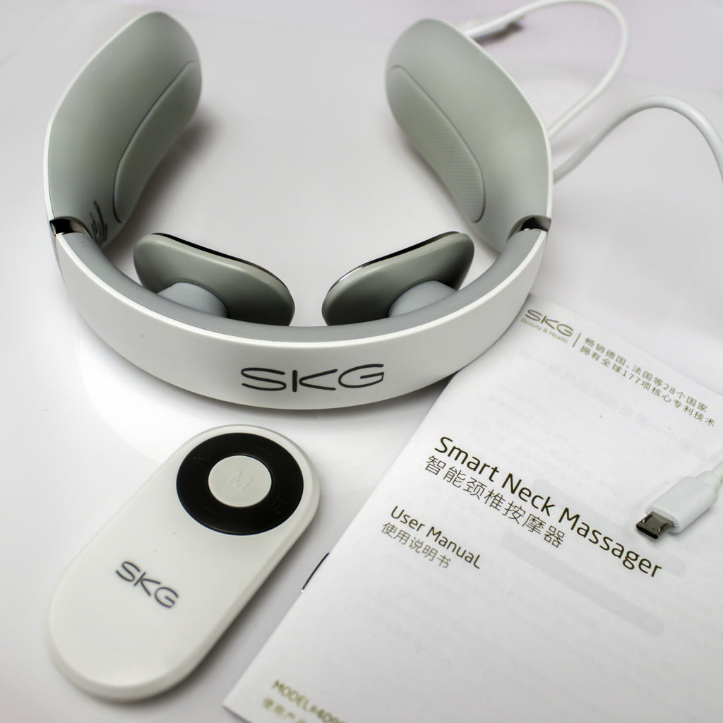 The SKG Neck Massager comes with optional remote, manual and USB charger cord