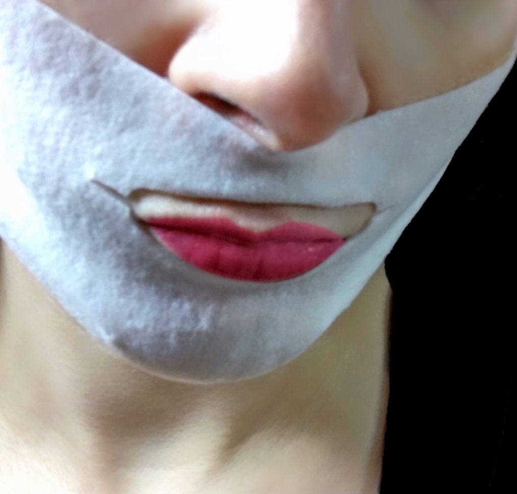 Mask covers lower face, jawline, mouth area wrinkles, and chin