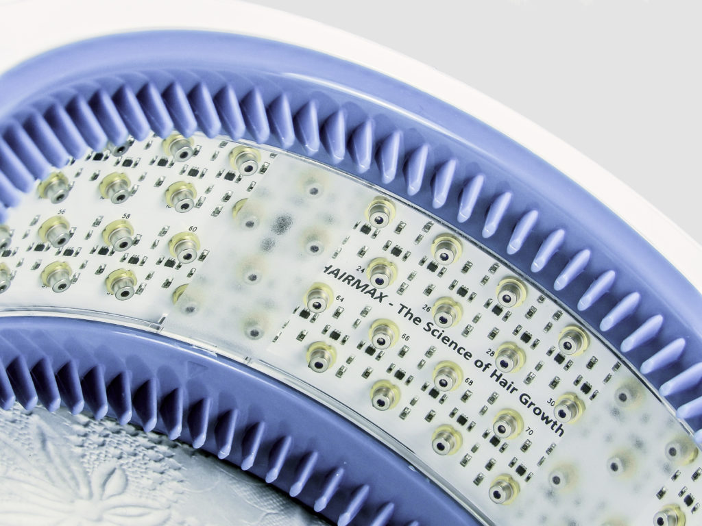 Close up of HairMax LaserBand 82. Note the medical-grade lasers and components