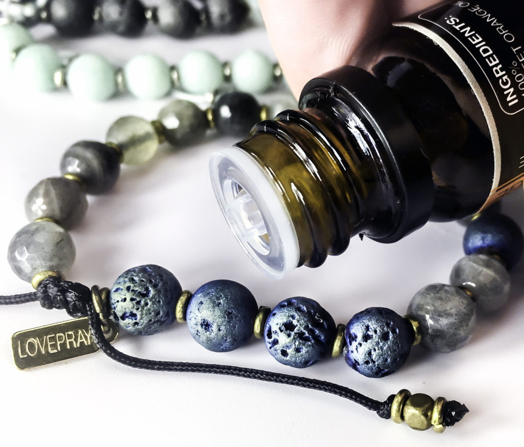 Add a drop of essential oil directly to the lava beads and rub in with your finger 