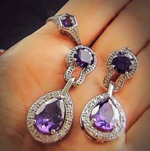 Espere Purple Zirconia Tear-Drop Dangle Drop Earrings vs an appraised Amethyst Ring