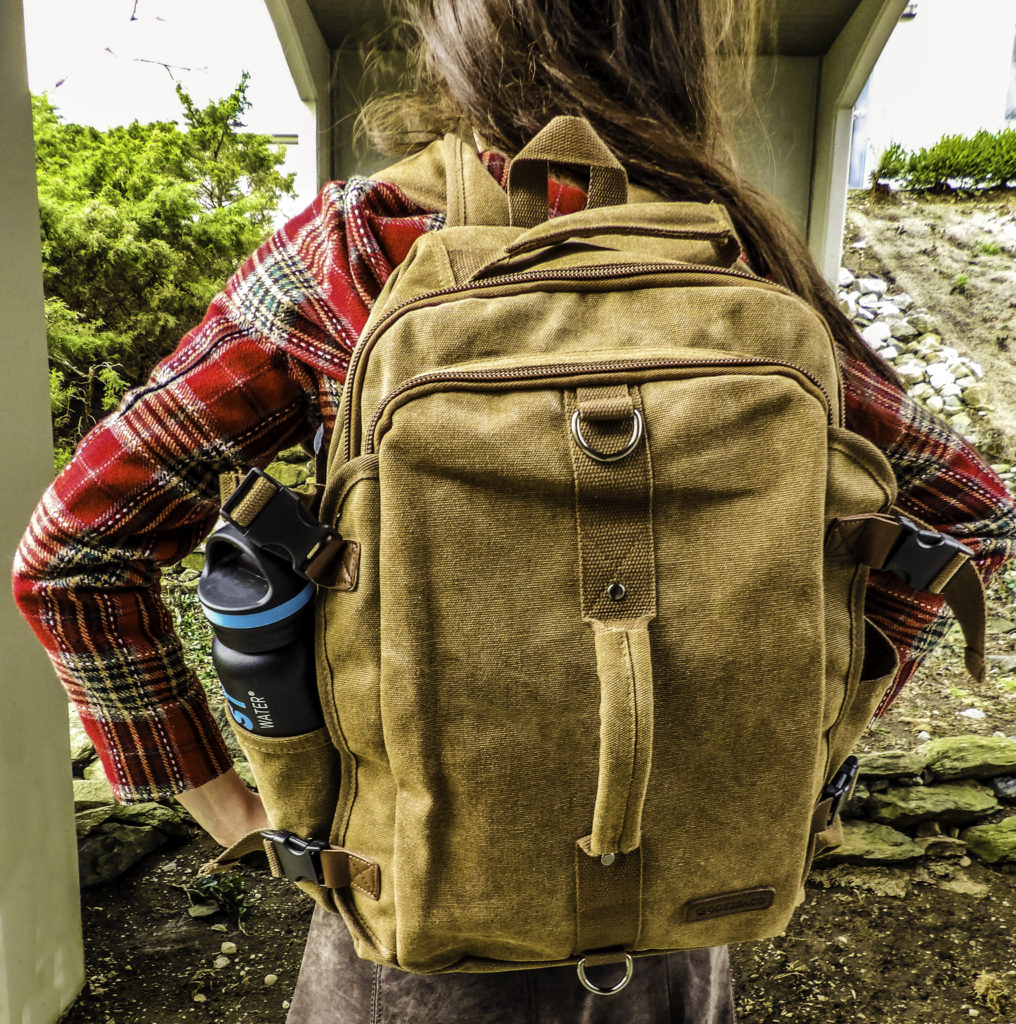 The Montera Vintage Canvas Backpack goes from the college classroom to the office in style