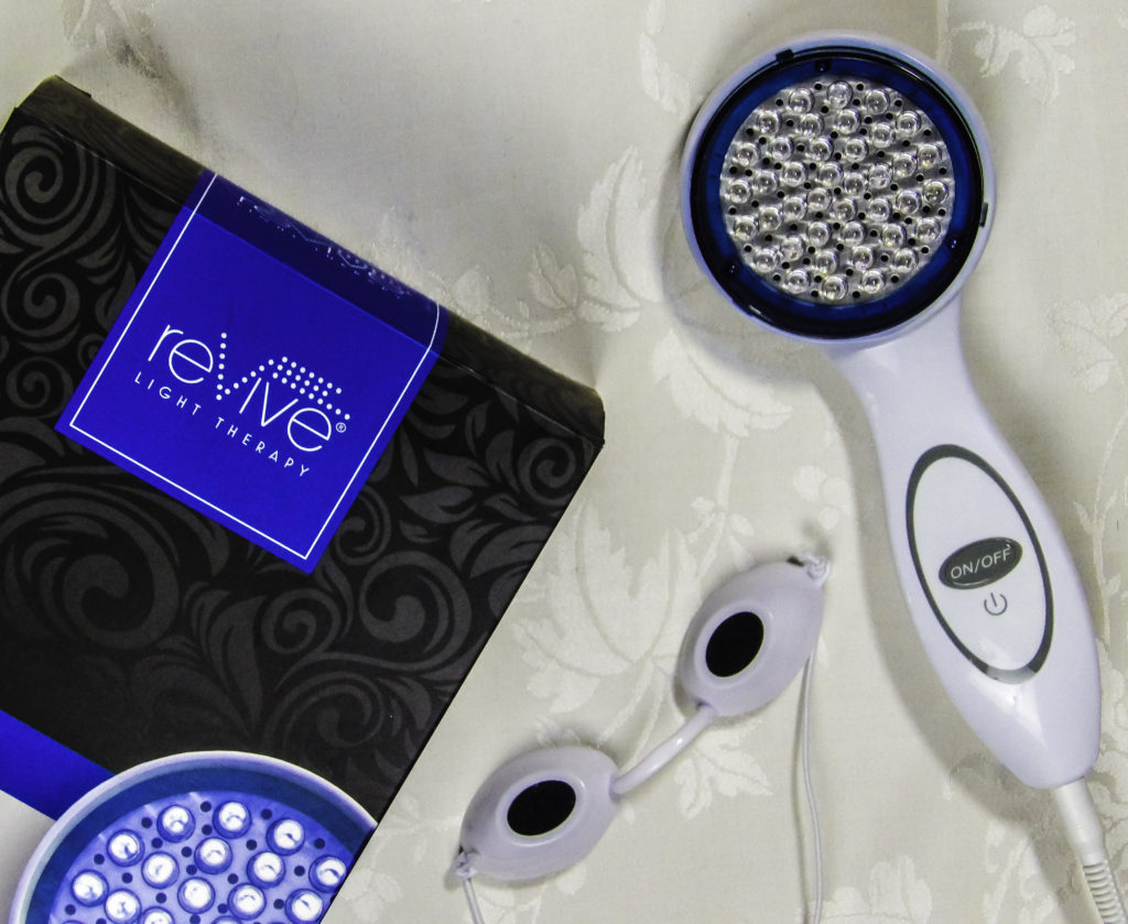 reVive LED Light Therapy Device and goggles