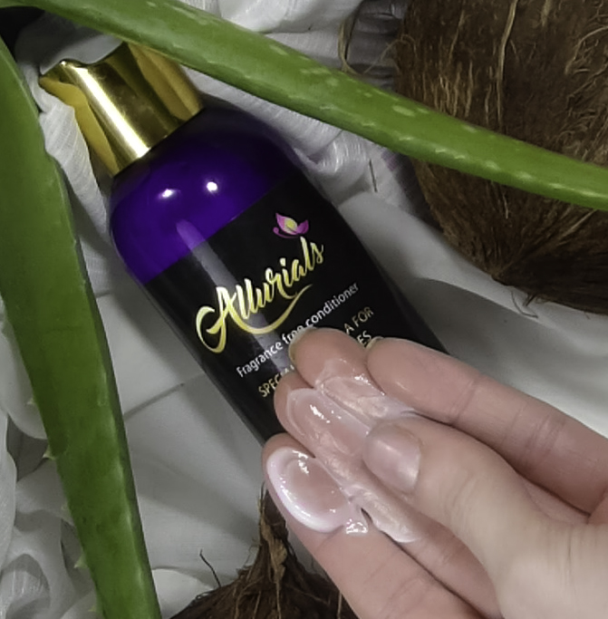 Rub the creamy conditioner between your fingers before applying to hair