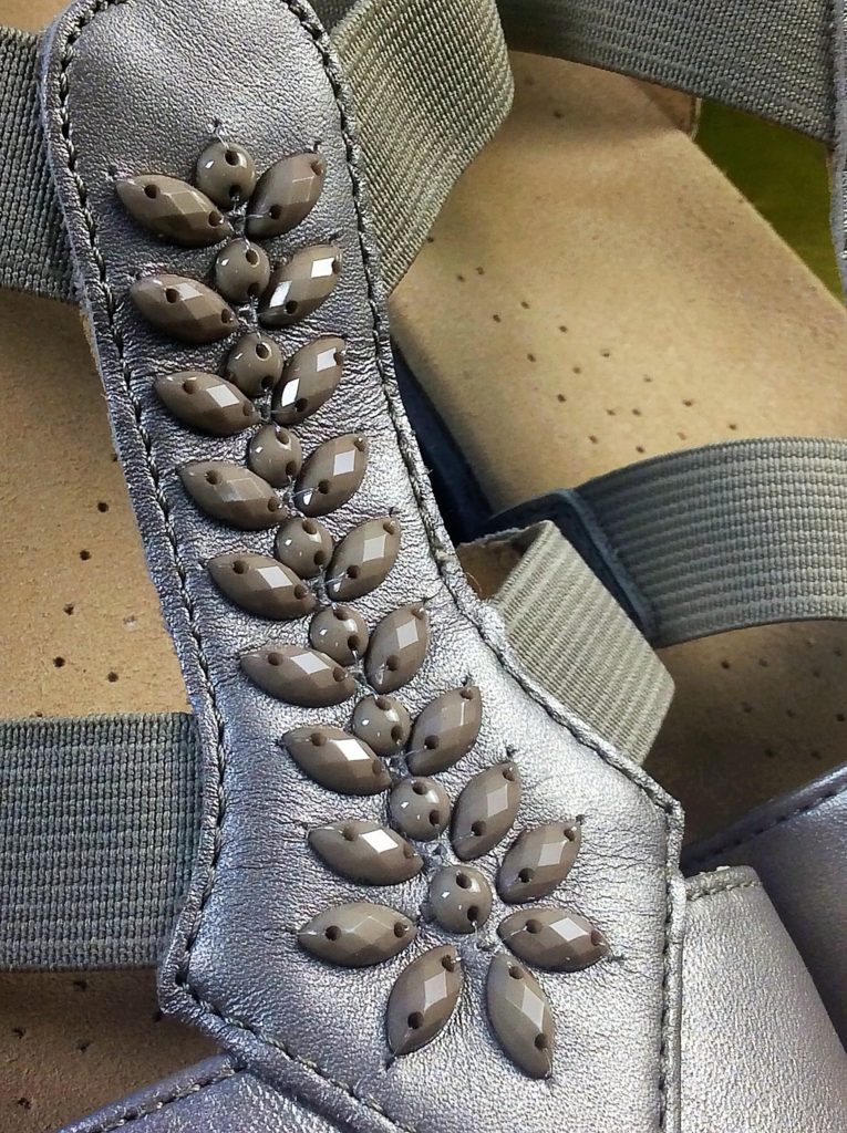 The beading on the t-bar of the Beam Sandal 