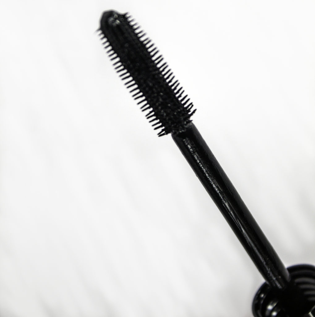 Unique bristles define and separate while coating and combing every lash