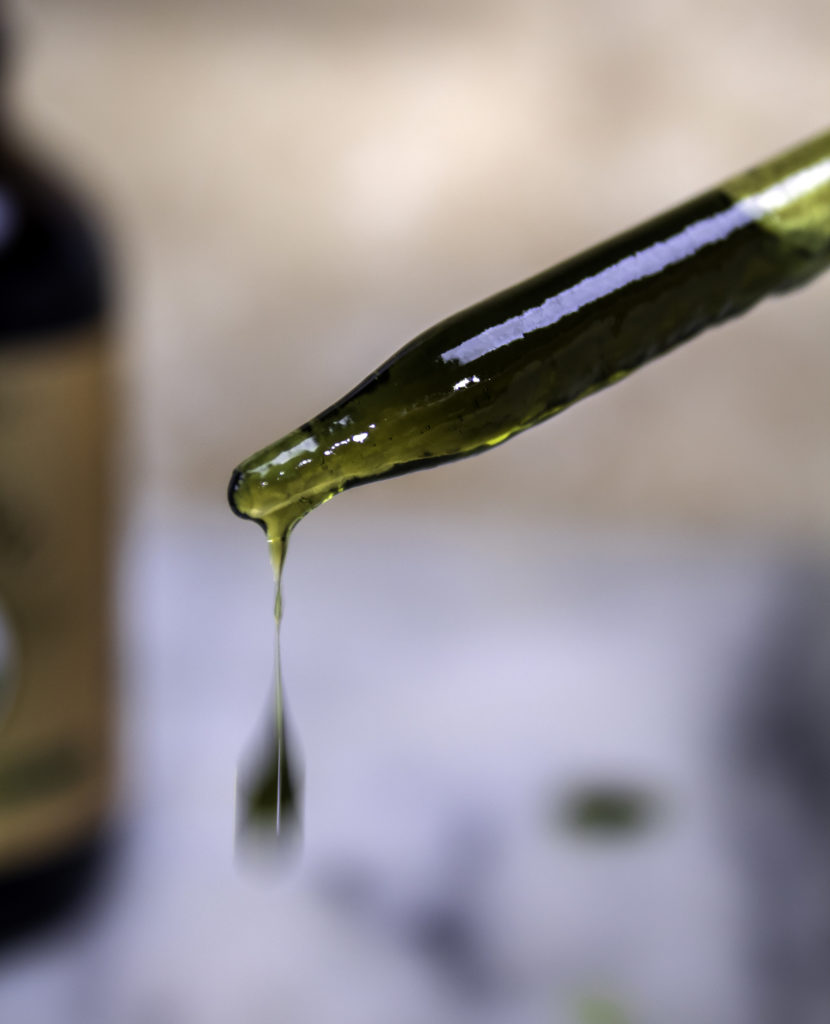 Just a drop of Tamanu Oil treats scars, acne, and dry skin