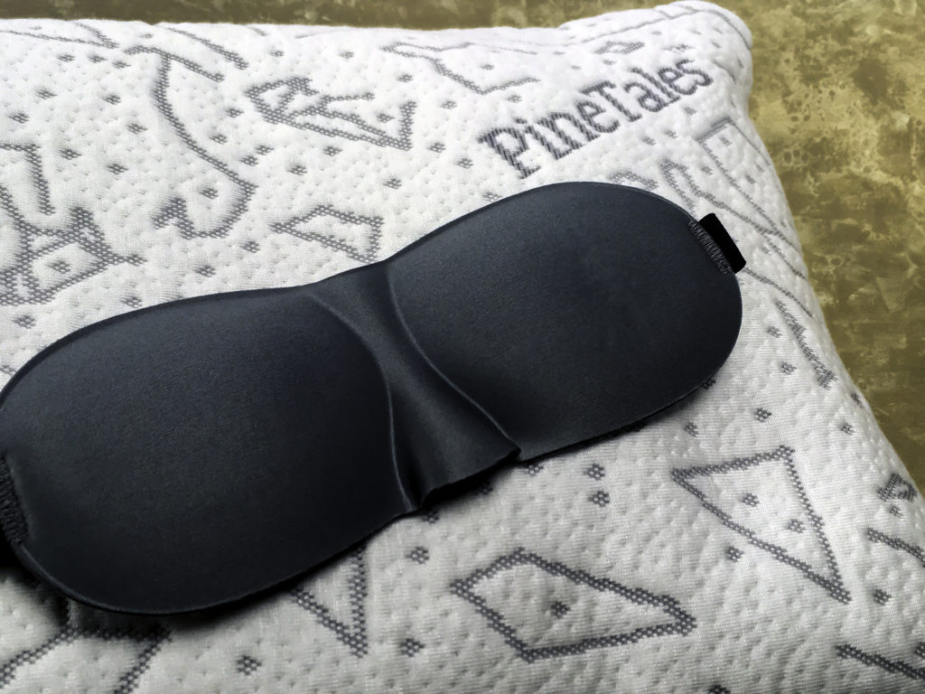 The pillow came with a soft, silky eye mask. Sweet dreams!