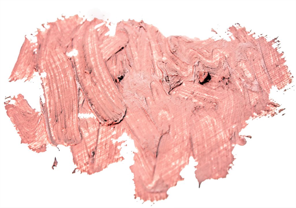 A smooth textured pink-nude lipstick