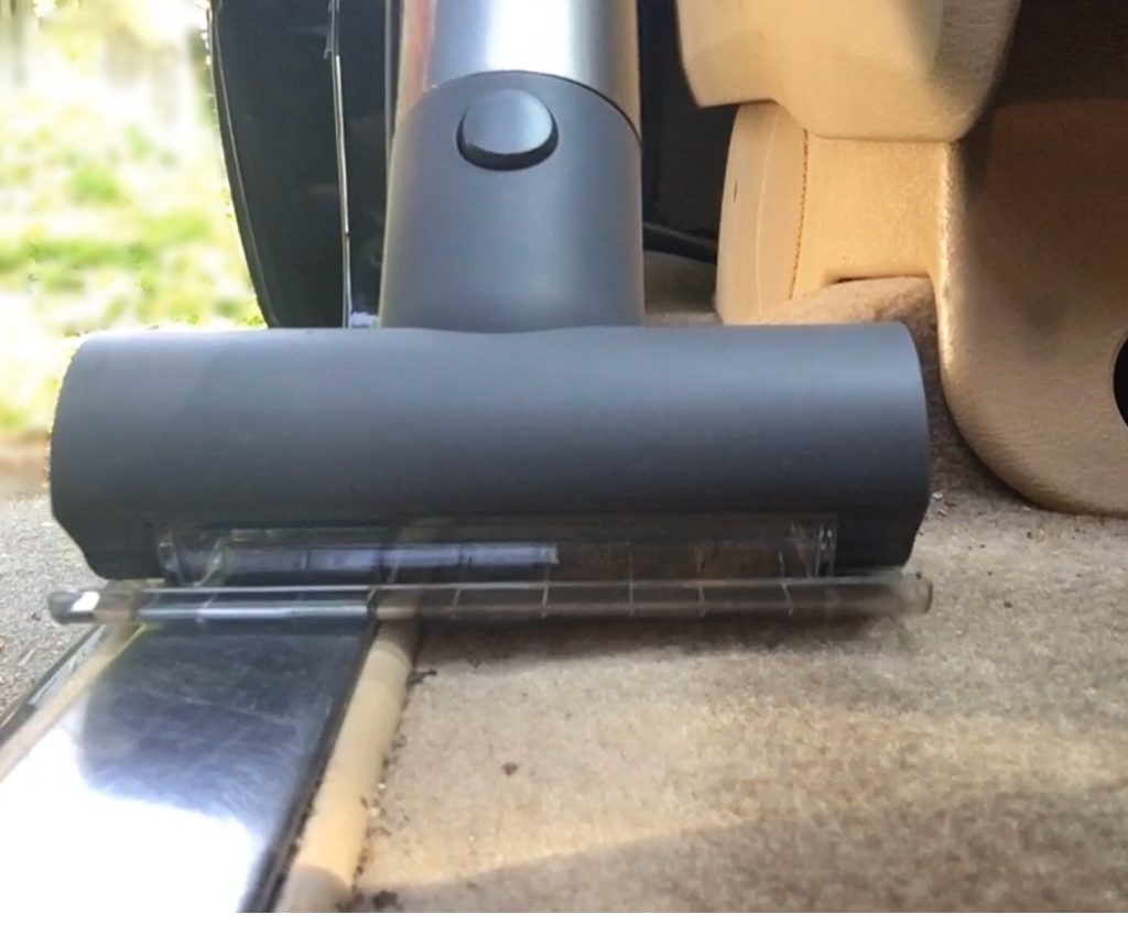 This attachment works great in the car as it can handle uneven surfaces like metal, plastic, and upholstery. 